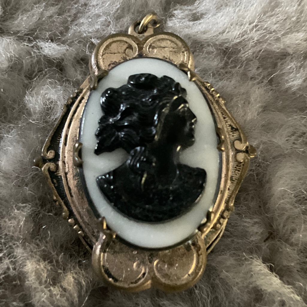Antique Black And Gold Cameo Brooch